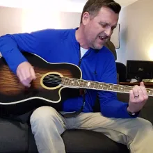 Scott playing guitar